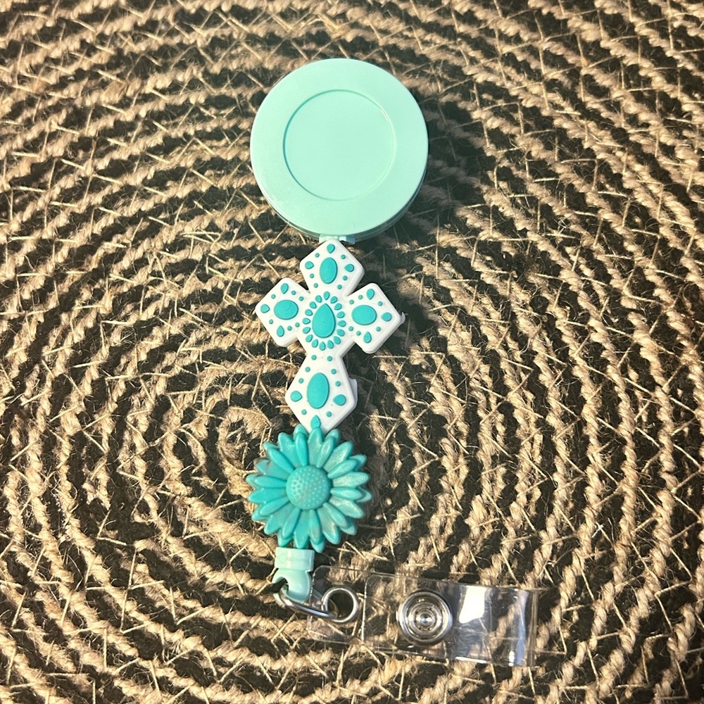 Cross Badge Reel